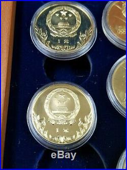 1980 LAKE PLACID CHINESE COIN SET withwooden box. 11 coins total