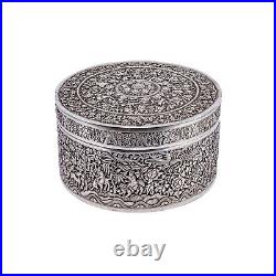 A Mid-nineteenth century Chinese Straits silver repousse cylindrical lidded box