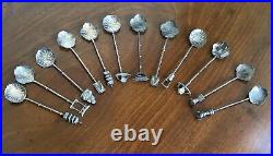 A Set Of 12 Chinese Sterling Silver Teaspoons With Decorated Terminals. Boxed