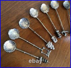 A Set Of 12 Chinese Sterling Silver Teaspoons With Decorated Terminals. Boxed