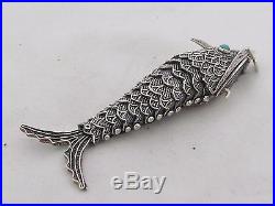 A Solid Chinese Silver Filigree Articulated Fish Pill Box Pendant