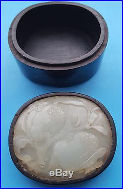 Chinese pale Celadon Jade plaque inset in a Zitan Silver wire wood box. Qianlong