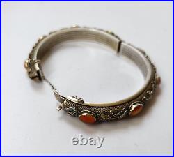 Chinese silver bracelet with carnelian gilt and enamel