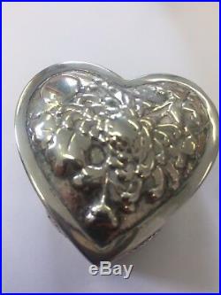 Chinese silver heart-shaped pill box, embossed with flowers. Woshing, Shanghai