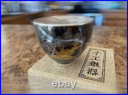Chinese silver tea cup in gift box