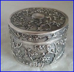 Late C19 Chinese Export silver Box. Decorated in relief with blossoms. By Luen Wo
